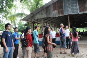 Edward from HKU gives the volunteer a tour of the current school site at KKB